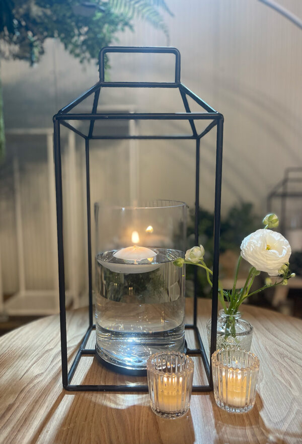 Black metal lantern with glass cylinder